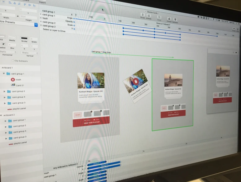 The drag-and-drop card animations being built in a prototyping tool, motion paths laid out across artboards.