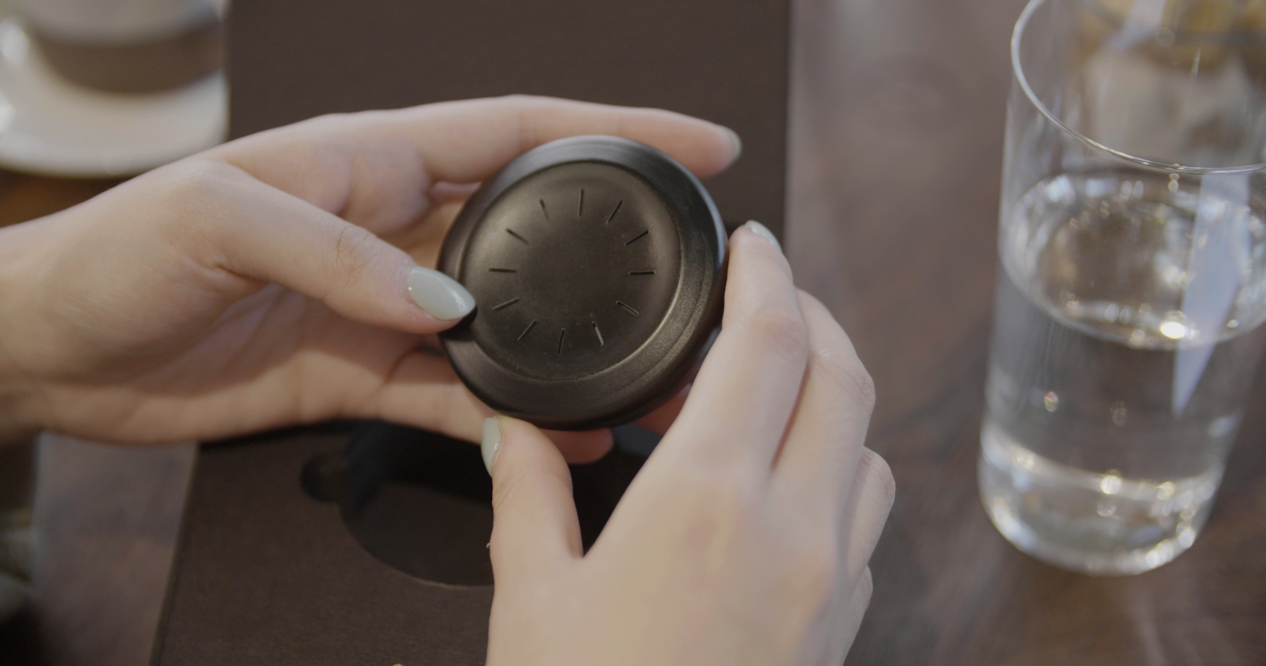 The Mercedes-Benz connected smart key held in hand